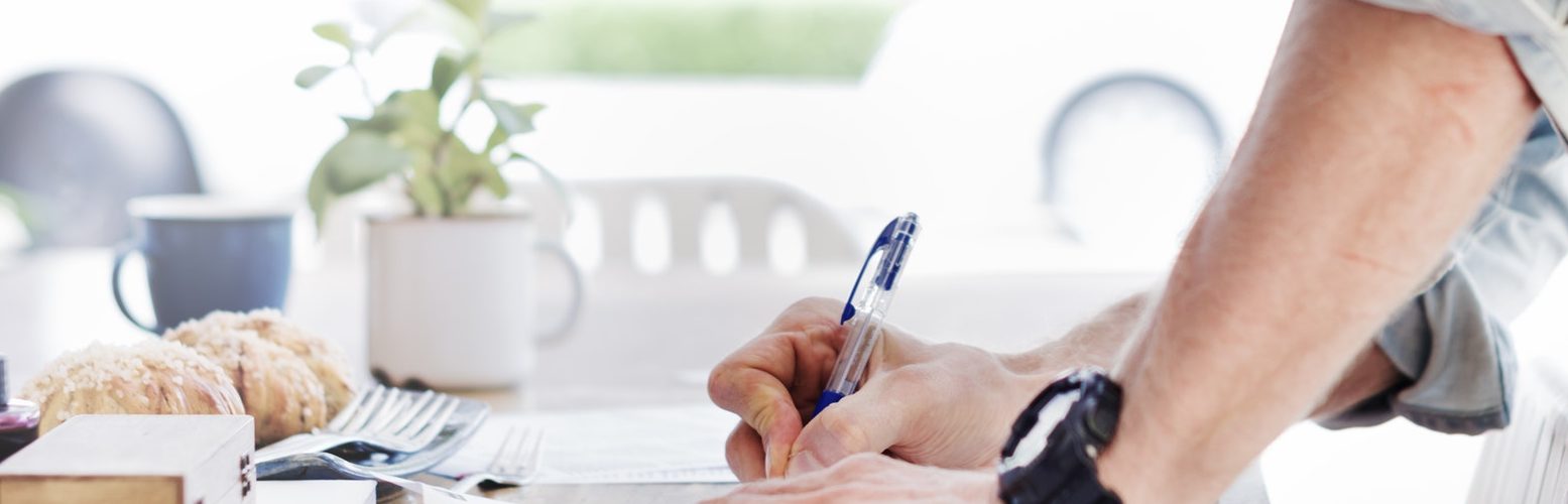 Man signing contract