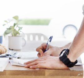 Man signing contract